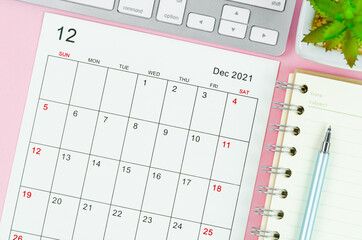 December 2021 calendar sheet with keyboard computer