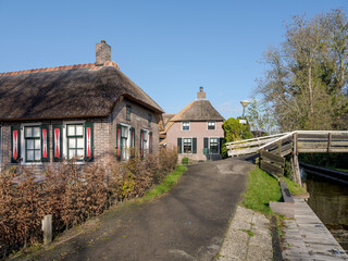 Centuries-old thatched-roof houses in Giethoorn, Steenwijkerland, Overijssel Province, The Netherlands
