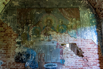 Fototapeta na wymiar painting of the walls of an abandoned Orthodox church