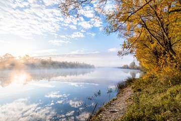 autumn landscape river in the morning fog over the water. panorama of the river in autumn. the...