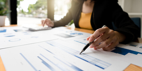 Close up view of bookkeeper or financial inspector hands making report, calculating or checking balance. Home finances, investment, economy, saving money or insurance concept.