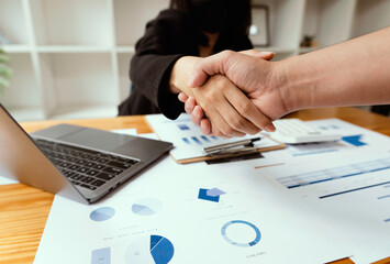 Fototapeta premium business partnership handshake concept.Photo of two businessmen handshaking process.Successful deal after great meeting.