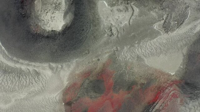 4k aerial view of some red colour extinct volcanoes in the highlands of Iceland.