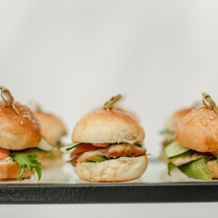 Buffet snacks. Party catering, fast food, burgers, capapé and bruschetta