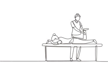Continuous one line drawing physiotherapy rehabilitation assistance. Cute woman patient lying on massage table therapist doing healing treatment massaging injured foot. Single line draw design vector