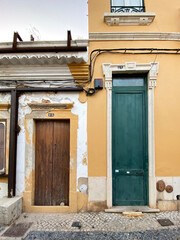 Tall and short doors of Portuguese algarve village