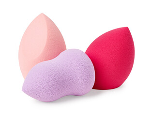 Pink and purple beauty sponges isolated on white background