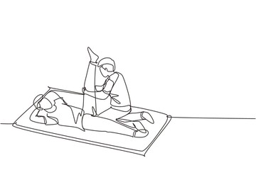 Single one line drawing rehabilitation center. Massage therapy. Male physiotherapist giving leg massage to patient lying on the floor. Modern continuous line draw design graphic vector illustration