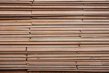 Close-up photo of brown cardboard sheets from under the boxes