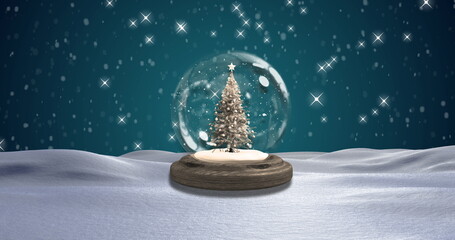 Snow falling over Christmas tree inside snow globe against green background