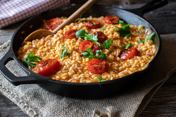 italian risotto with tomatoes and parmesan cheese