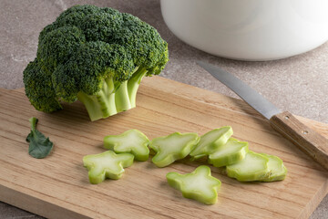 Fresh raw broccoli and a chopped stem