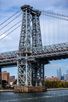 A view of Williamsburg Bridge from the East River in New York City