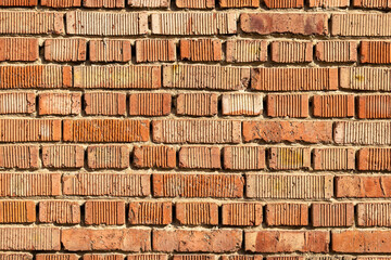 Clean orange brick wall, classic mortar joint texture