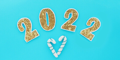 banner inscription 2022 in gold numbers on a blue background..