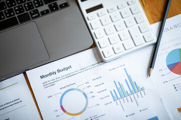 The Financial accounting calculate concept with calculator graphs and charts