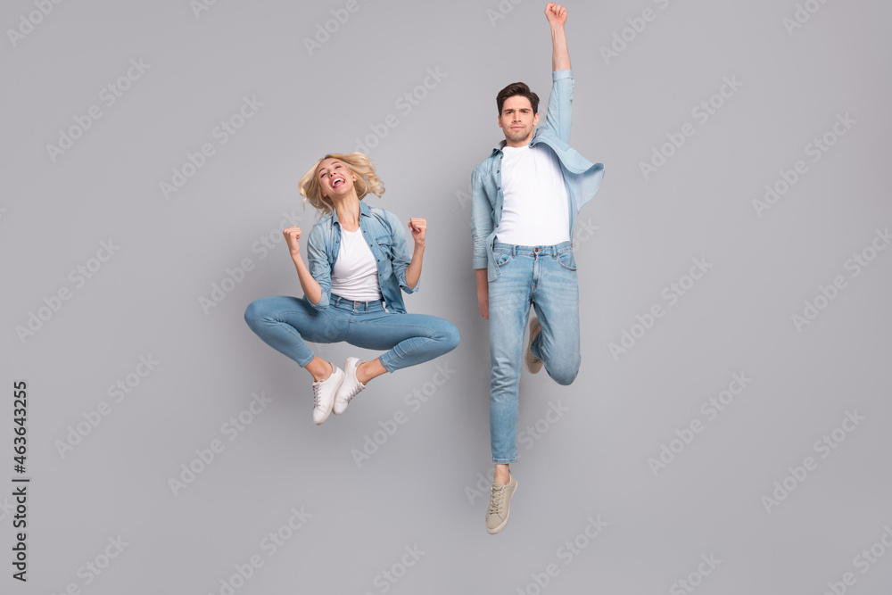 Sticker full size photo of young couple happy positive smile have fun fooling fly isolated over grey color b