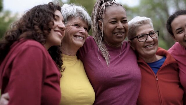 Multi generational women meet and hugging each other at city park - Multiracial people having fun taking a selfie outdoor