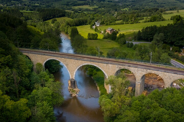 Fototapeta na wymiar Railroad bridge in Roanne-Coo, Belgium. Aerial view.