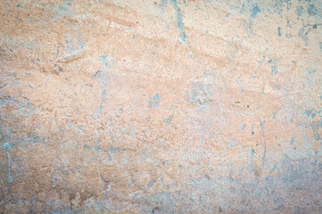 Gray-pink wall of an old house background