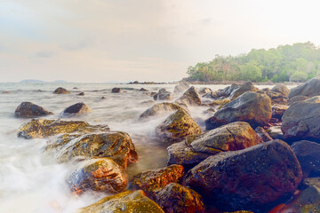 Long exposure tropical rocky beach at Laem Hua Mong - Kho Kwang Viewpoint in Chomphon province Thailand