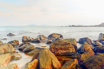 Long exposure tropical rocky beach at Laem Hua Mong - Kho Kwang Viewpoint in Chomphon province Thailand