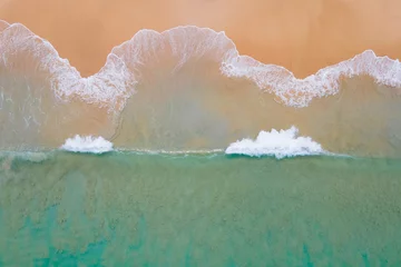 Stoff pro Meter Aerial view of turquoise ocean wave reaching the coastline. Beautiful tropical beach from top view. Andaman sea in Thailand. Summer holiday vacation concept © zephyr_p
