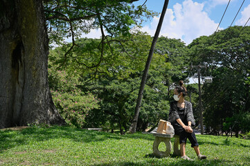 Series photo of young women waiting something in a public park