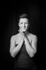 Black and white portrait of a beautiful woman with a short haircut mohawk emotions mood