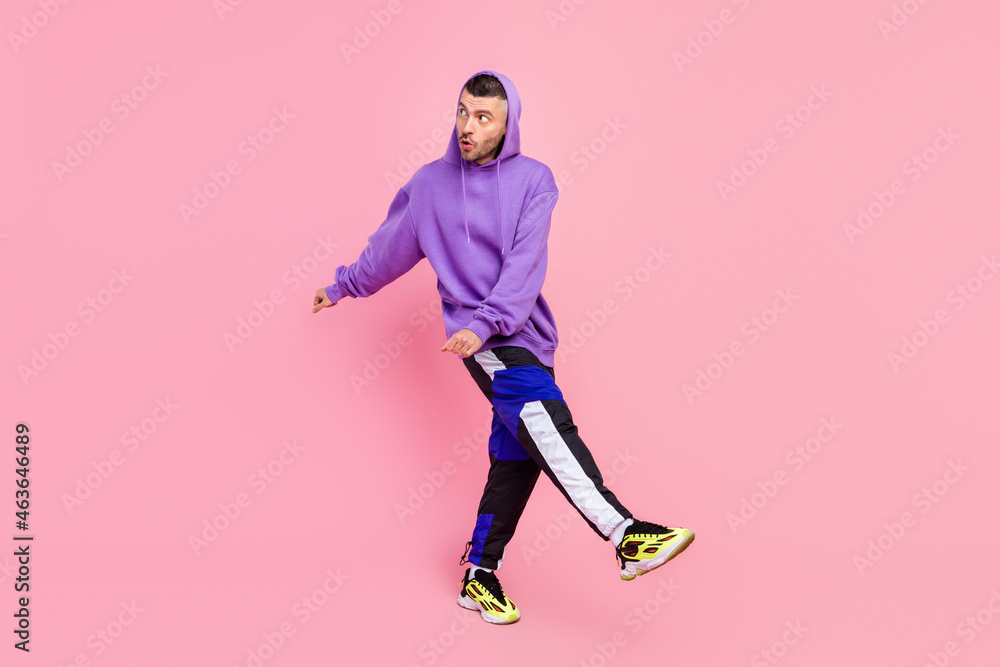 Sticker Full length photo of curious young brunet guy dance wear hoodie pants shoes isolated on pink color background