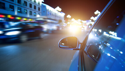 night drive ,shoot from the window of speed car, motion blur steet light.