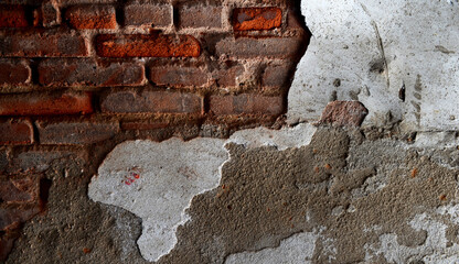 cracked concrete old brick wall background.