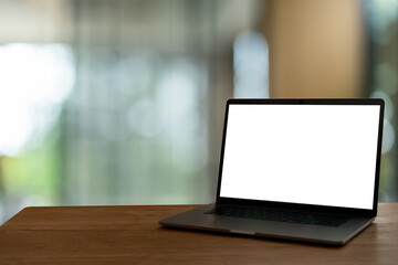 laptop on wooden table