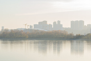 NOVOSIBIRSK, RUSSIA-17 October  2021: View of the city from the river. Smog air pollution 