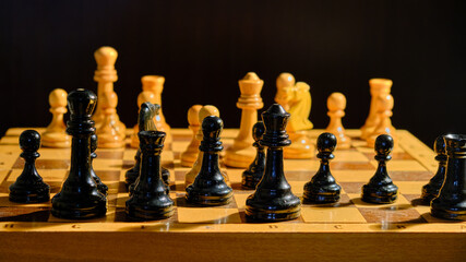Playing old chess on a black background, retro board game
