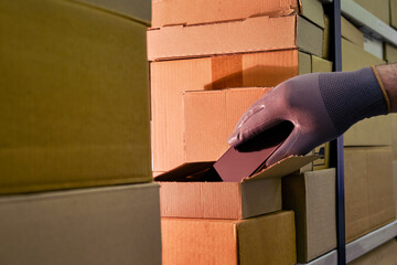 Theft of a phone from a box in a warehouse when sent by mail