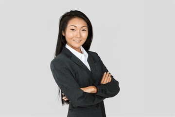 Portrait of young successful woman worker employee stand