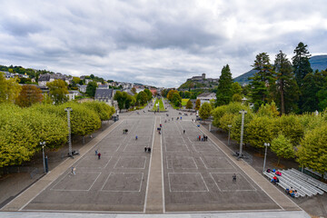 Lourdes, France - 9 Oct 2021: Views of the Rosary Basilica Esplanade