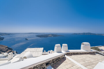 Fototapeta premium Traditional white buildings and rooftops in the villages of Santorini Island in Greece