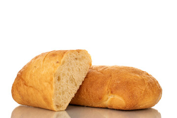 One whole and one half fragrant ciabatta, close-up, isolated on white.