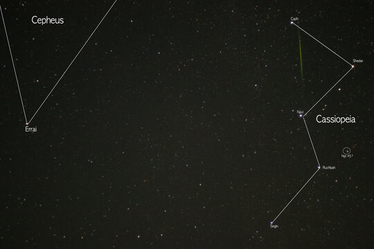 This is a picture of the constellation Cassiopeia. You can see a meteor shower passing through the constellation Cassiopeia.
