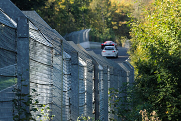 Naklejka premium Security fence on german racing circuit Nürburgring Nordschleife - Stockphoto