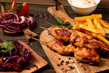 Arabic traditional cuisine, Shish tawk with potatoes and red cabbage salad, homemade, no people,