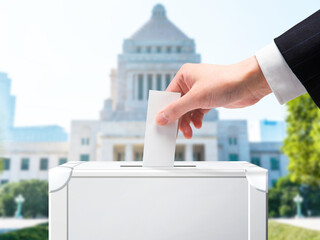 投票する・選挙・国民投票・国会議事堂のイメージ素材