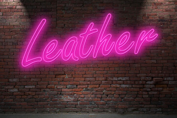 Fototapeta na wymiar Neon Bondage Leather lettering on Brick Wall at night