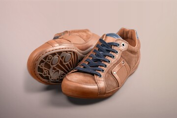 Studio product advertisement shot of running shoes on a white background