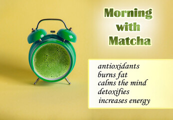 Tasty matcha tea in a green retro alarm clock on yellow background. Benefits of waking up with matcha green tea concept