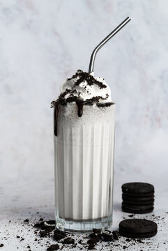 Glass of milkshake with cookies