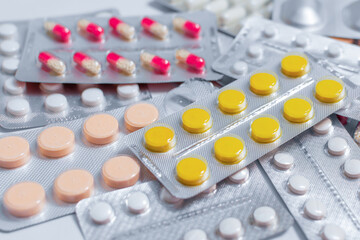Blisters with multicolored pills.Medical preparations