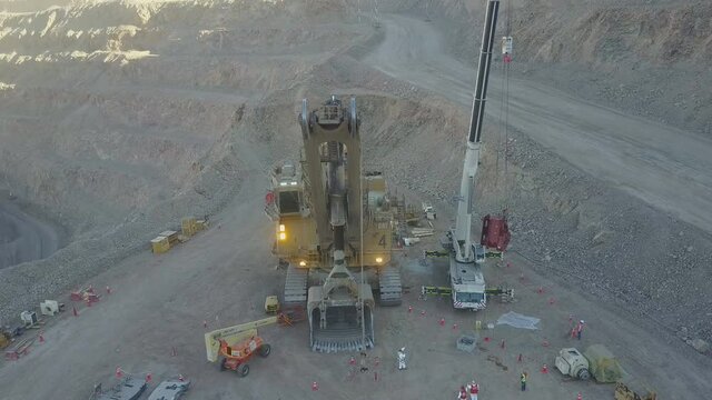 Aerial view of the repair of a large excavator at a mining quarry (China)